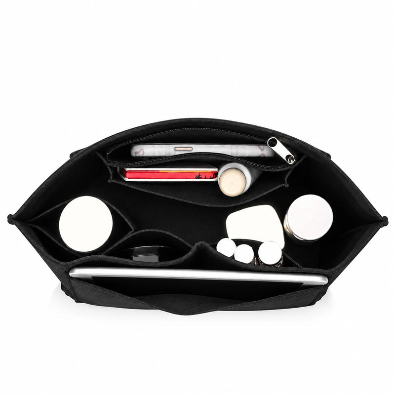 The Insert Organiser in pressed felt, compartments filled with a phone, notebook, bottle and cosmetics — Maison Harlowe