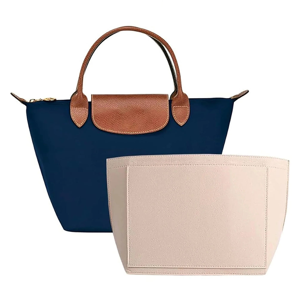 Felt organiser insert inside a bag, showing the upright side pockets keeping items visible