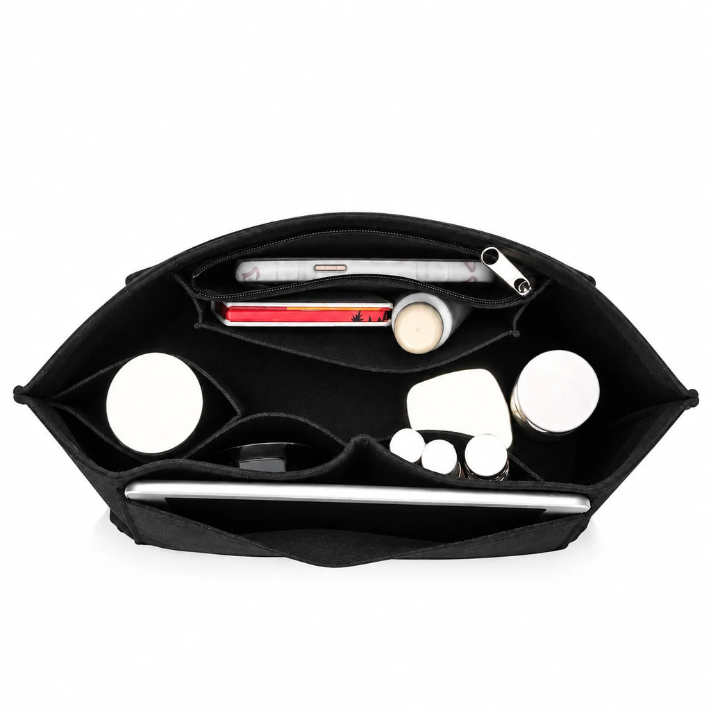 The Insert Organiser in pressed felt, compartments filled with a phone, notebook, bottle and cosmetics — Maison Harlowe